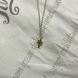 I’m selling the pretty cactus necklace and it’s made by hand